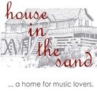 house in the sand