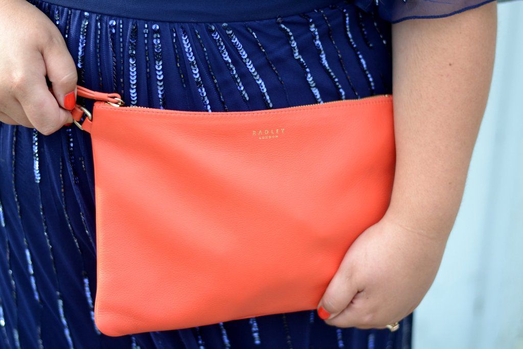 href="http://www.fromthecornersofthecurve.com/Radley-London-orange-clutch.jpg" title="studio-8-plus-size-dress"><img src="http://www.fromthecornersofthecurve.com.com/Radley-London-clutch.jpg" title=Radley-London" alt="Radley-London"></a>