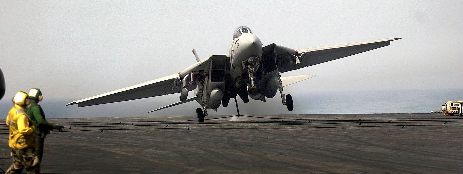 US_Navy_030415-N-4142G-106_An_F-14D_Tomcat_assigned_to_the_ldquoBounty_Huntersrdquo_of_Fighter_Squadron_Two_VF-2_makes_a_har_zps39024fb9.jpg